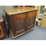 A carved oak cupboard, 72 x 77 x 52cm