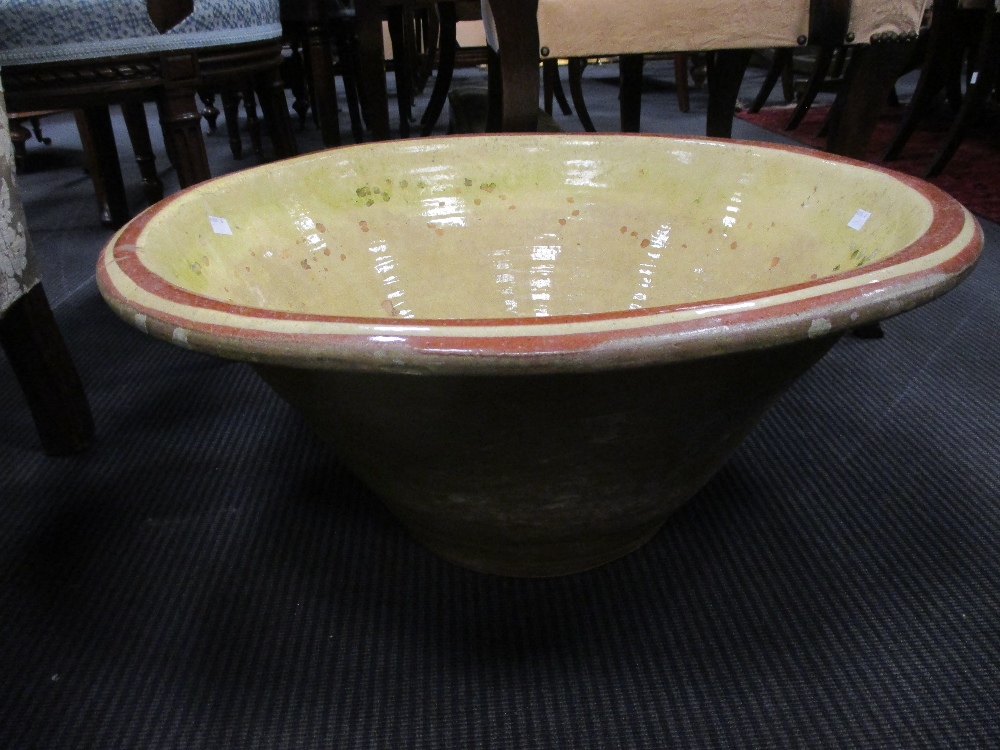 A pottery dairy bowl, 29 x 64cm