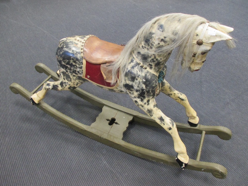 A mid 20th century dapple grey rocking horse, 84cm high