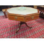 A 19th century octagonal mahogany library table, on an associated stand
