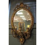 A pair of oval Victorian girandoles, with gilt gesso moulded frames (repainted) (2)