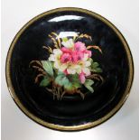 A Royal Worcester dessert service, the black ground bodies painted and gilt with floral bouquets,