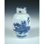 An 18th century blue and white covered jar, the pill box cover painted in Kangxi style with a