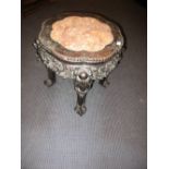 A late 19th century marble inset hardwood stand, the octafoil top with beaded edge, the four