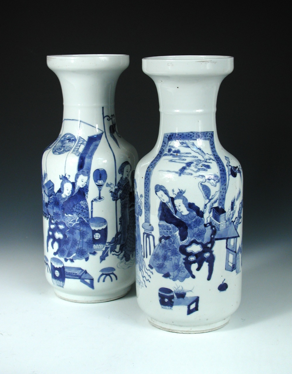 A pair of late 19th/early 20th century blue and white vases, four character marks of Kangxi, each