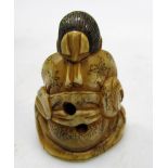 Four late 19th/early 20th century marine and elephant ivory netsuke, variously depicting; Ebisu