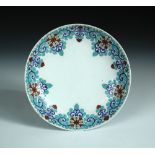 An Arita plate in Nabeshima taste, possibly 18th century, painted with a cinquefoil flower and