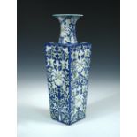 A 19th century blue ground square sectioned vase, the interior of the flared rim glazed turquoise,