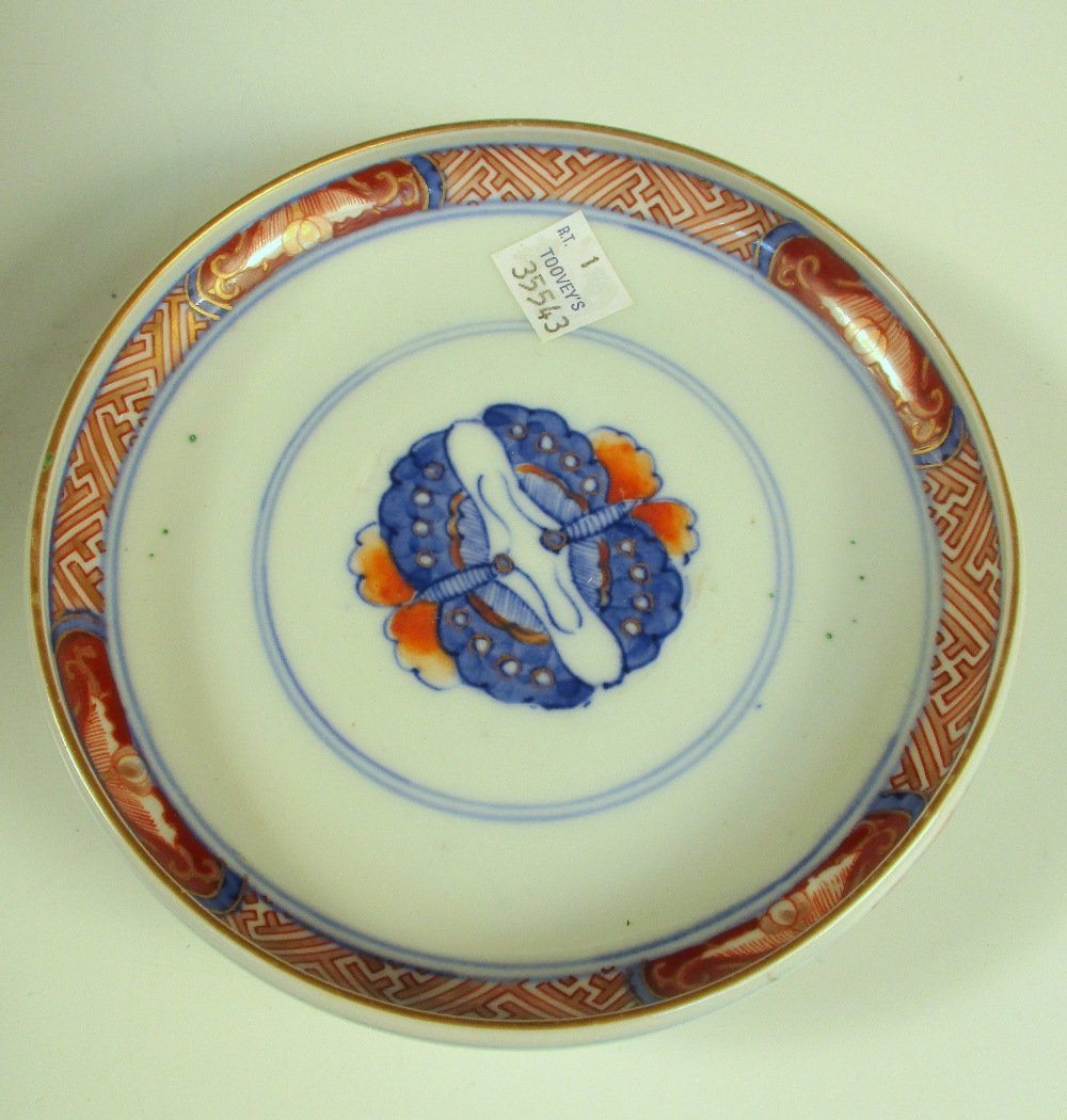 A Canton basket, a blue and white bowl, a covered Imari bowl and another, the oval centre of the - Image 18 of 19