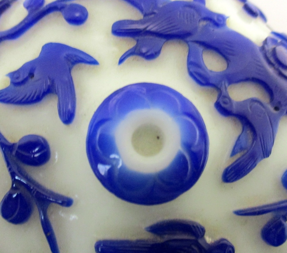 A Pekin blue overlay milk glass box and cover, the footed bun shape carved in relief with birds - Image 2 of 4