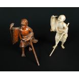 An early 20th century wood and an ivory carving of a lobster catcher, each standing exclaiming as