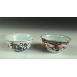 A wucai cup and another in Imari palette, the exterior of the first painted with chickens, six