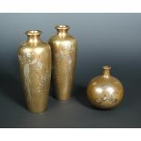A pair of late 19th/early 20th century inlaid bronze vases signed Nobuyoshi, mirror images of