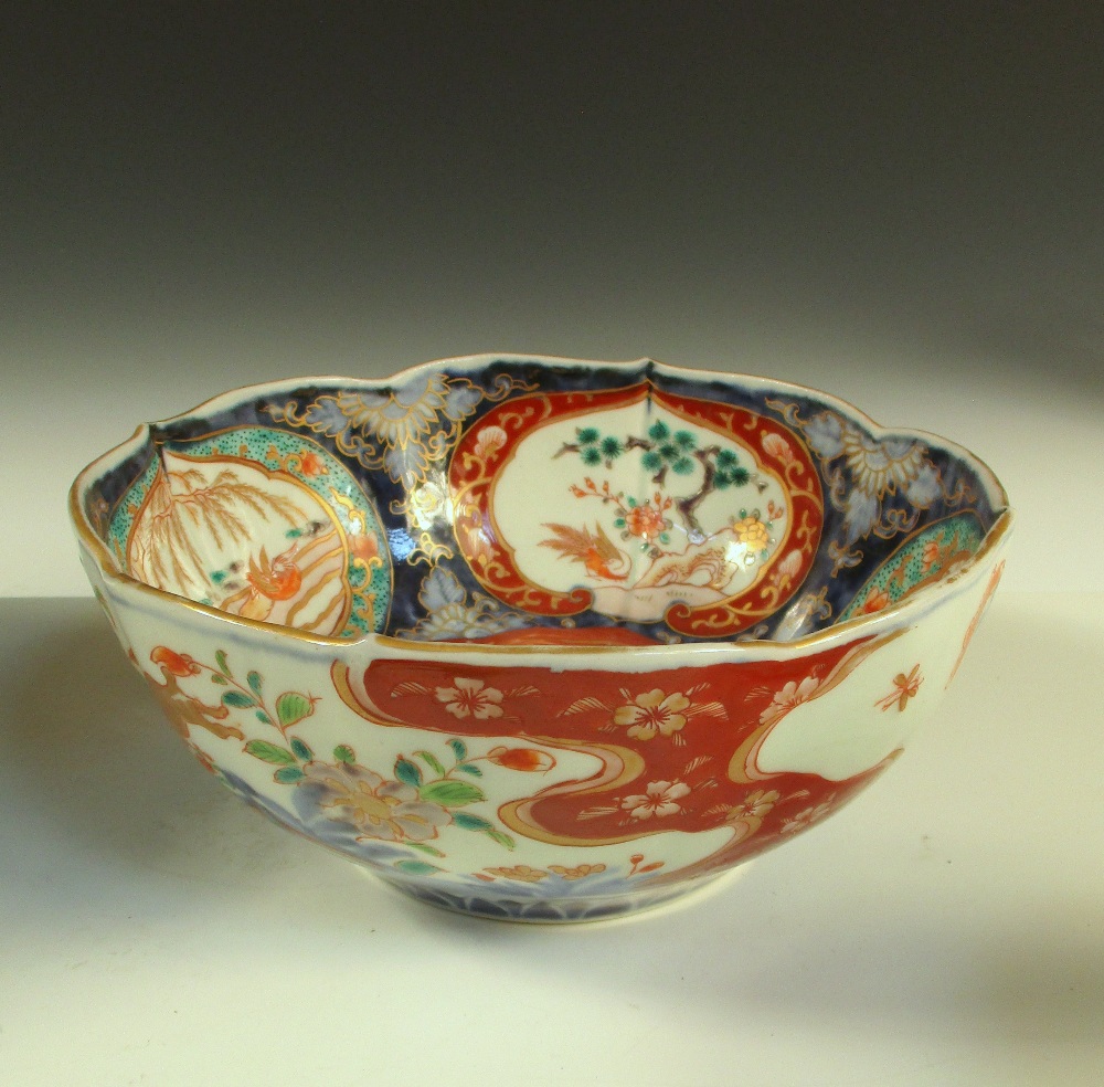 A Canton basket, a blue and white bowl, a covered Imari bowl and another, the oval centre of the - Image 10 of 19