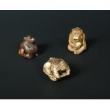 Tomokazu, a 19th century ivory netsuke carved as a vociferous monkey seated with a peach in hand,