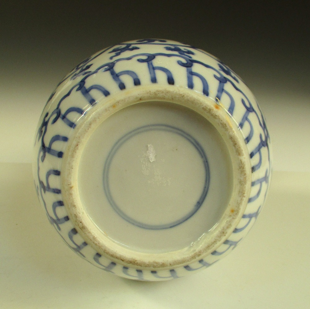 A Jiajing marked blue and white gourd shaped vase, the six character marks below the rim above two - Image 5 of 5