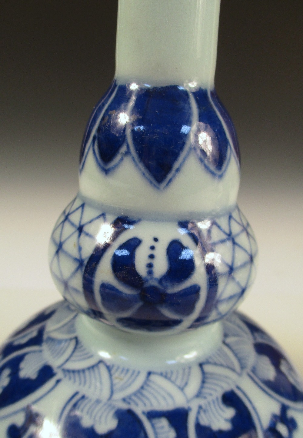 A pair of Kangxi style blue and white double gourd vases, the cylindrical necks with flared rims - Image 3 of 9