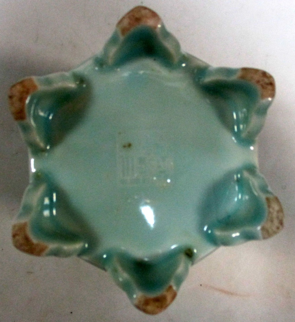 A pale celadon hexagonal brush pot, each side panel moulded in low relief with a different flowering - Image 5 of 5