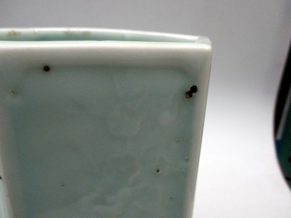 A pale celadon hexagonal brush pot, each side panel moulded in low relief with a different flowering - Image 3 of 5