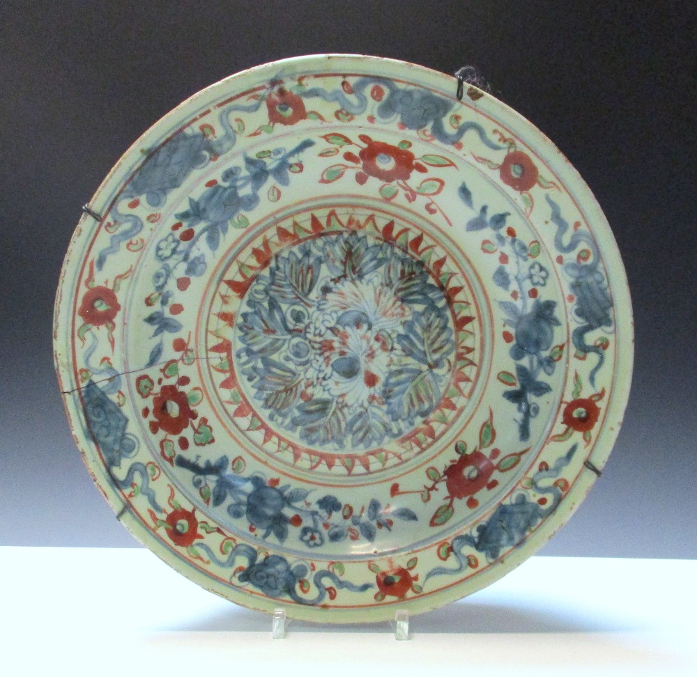 A 17th/18th century Swatow style dish painted in red and green over underglaze blue with precious