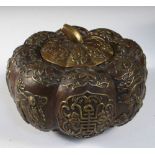 A bronze gourd shaped bowl and cover, the eight lobed melon shape cast with Shoulao centrally to