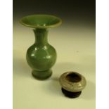 A Ming celadon vase and a later small crackle glazed jarlet, a wide flared rim raised over the