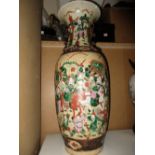 A 19th century crackleware vase painted with gatherings of soldiers between bronzed bands, the