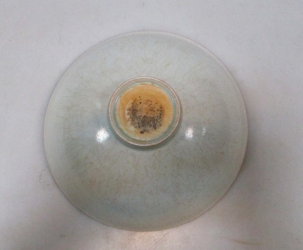 A Qingbai bowl, the misty blue glaze with a slight crackle over incised lotus scrolling on the - Image 3 of 3
