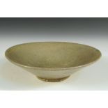 A Song celadon rounded conical bowl, the finely crackled grey green glaze overall, 15cm (6 in)