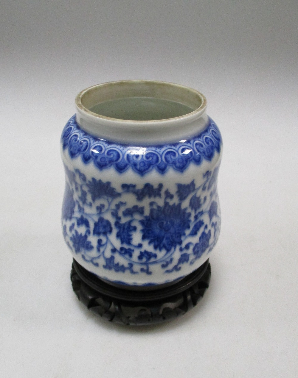 A Ming style blue and white jar painted with a ruyi lappet band on the rounded shoulders, the