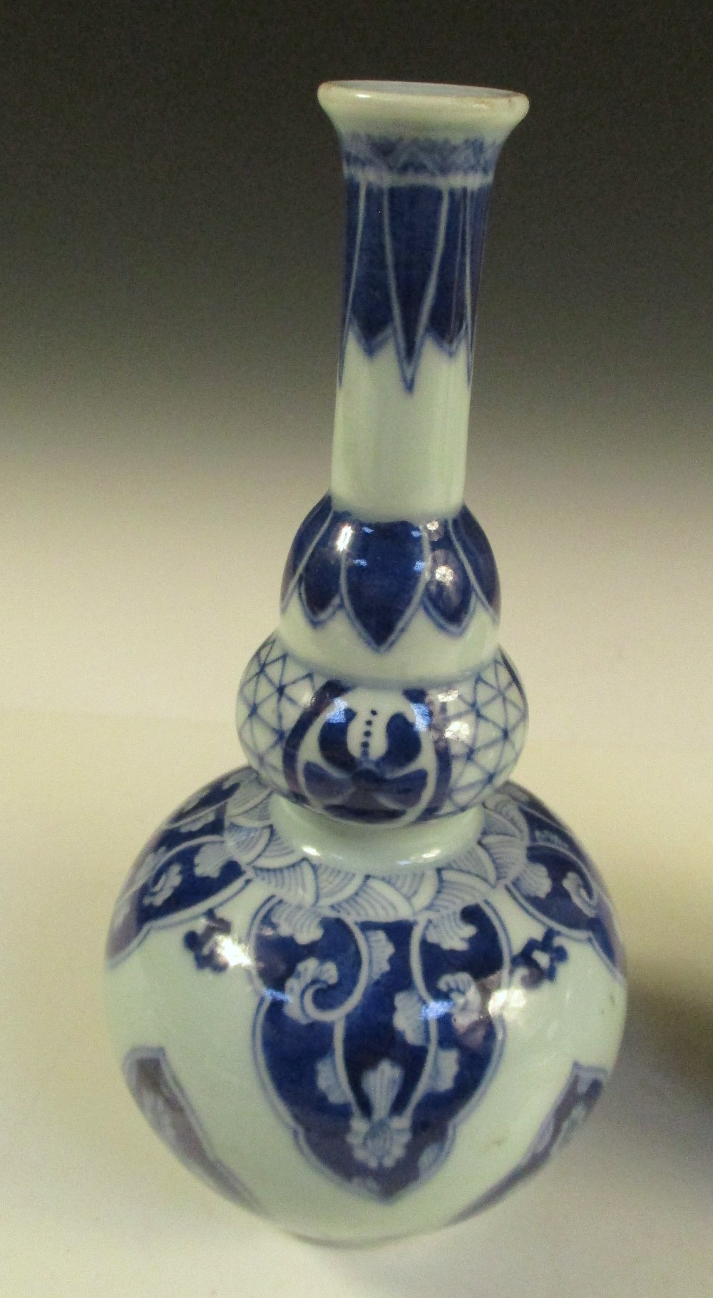 A pair of Kangxi style blue and white double gourd vases, the cylindrical necks with flared rims - Image 2 of 9