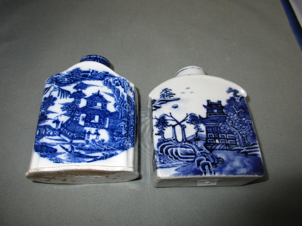 A 18th century blue and white and an English creamware tea caddy, the first painted with pavilions - Image 2 of 2