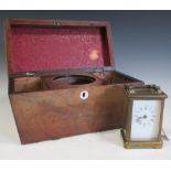 A brass cased carriage clock and a mahogany tea caddy (2)