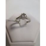 An 18ct single stone diamond ring, the claw mounted round brilliant cut stone, approx. 0.36cts,