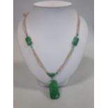 A jade and seed pearl necklace, the multi-strand seed pearl necklace fitted with rectangles of