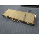 A Beretta leather bound monogramed canvas fitted 12 bore motoring case with three-piece cleaning rod