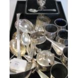 A quantity of silver and EPNS to include a ladle, christening set, salt, peppers etc