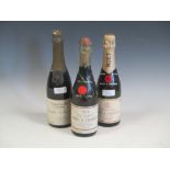 Three half bottles of champagne, Bollinger (no date), Moet & Chandon 1914 (low level, cloudy