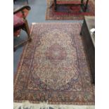 A Kashan rug (worn), 134 x 200cm