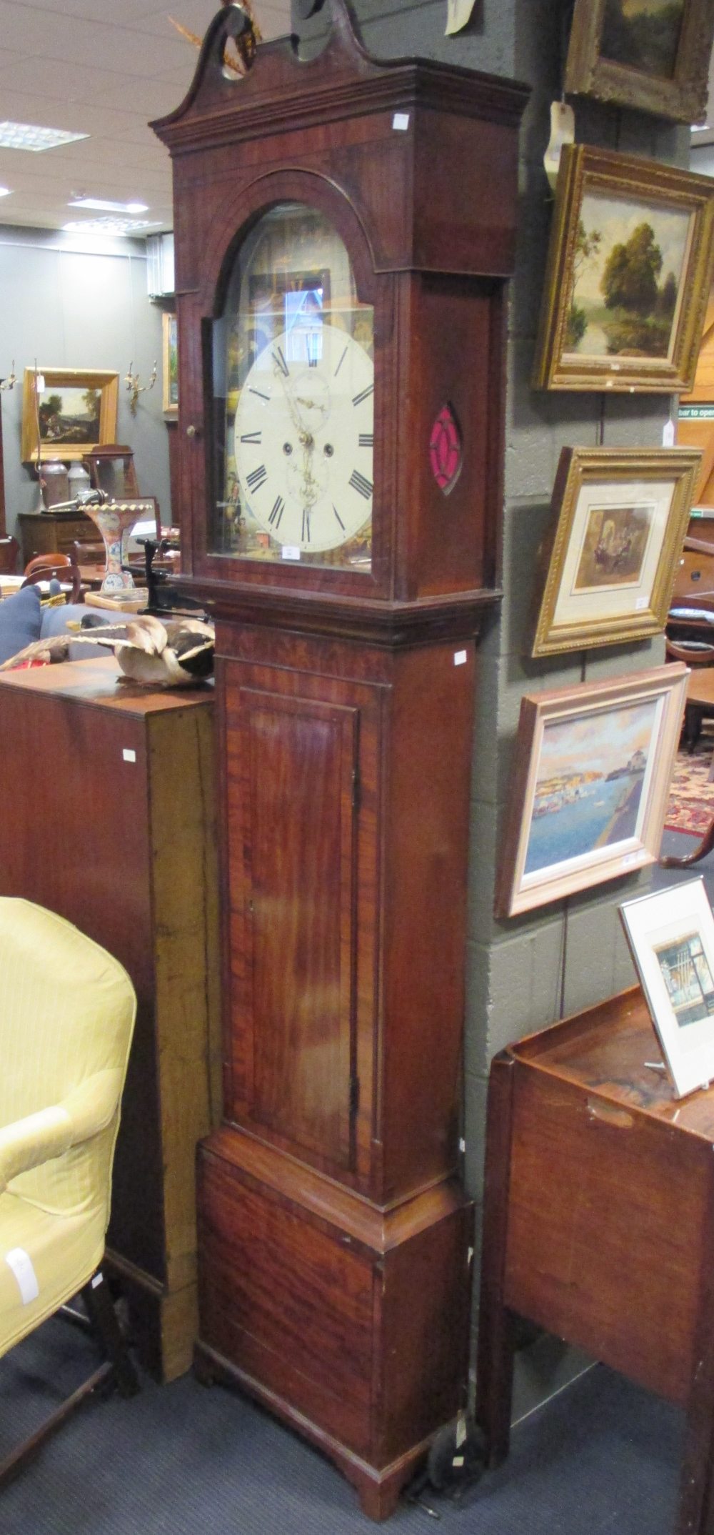 A Regency mahogany longcase clock with a painted arched dial depicting the seasons, 224 high