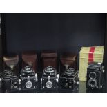 A Rolleicord La Model 1 camera and another Model 1, two Model K3 E's and a Model 4, together with