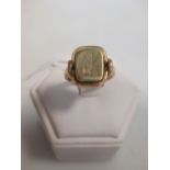 A gentleman's unmarked yellow precious metal signet ring, (tests as high carat gold) 11.4g