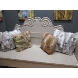 Four fur cushions