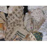 A collection of textiles, to include lace and indian hand embrodied items