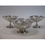 An early 20th century pierced silver basket and a pair of smaller baskets (3)