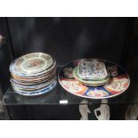 A collection of Chinese, Delft and other wall plates