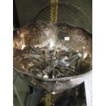 A brass wall mounted hanging bell together with an electroplated punch bowl and ladle and an