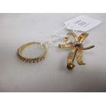 An 18ct pearl ring and an 18ct diamond set bow brooch, 9.6g gross (2)