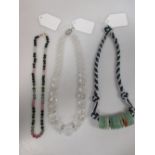 A multi colour tourmaline bead necklace with 14k clasp, a rock crystal bead necklace with silver T-