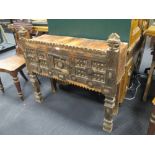 An Indian side table with carved decoration, 84 x 92 x 31cm